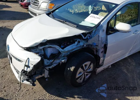 2018 Toyota Prius Two from USA, damaged, VIN JTDKBRFUXJ3062023